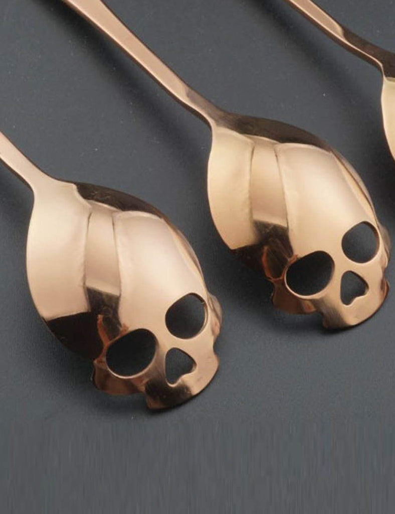 Copper color Skull teaspoon in stainless steel.